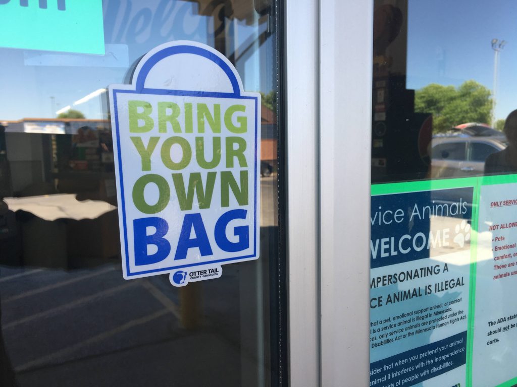 bring your own bag decal on store window