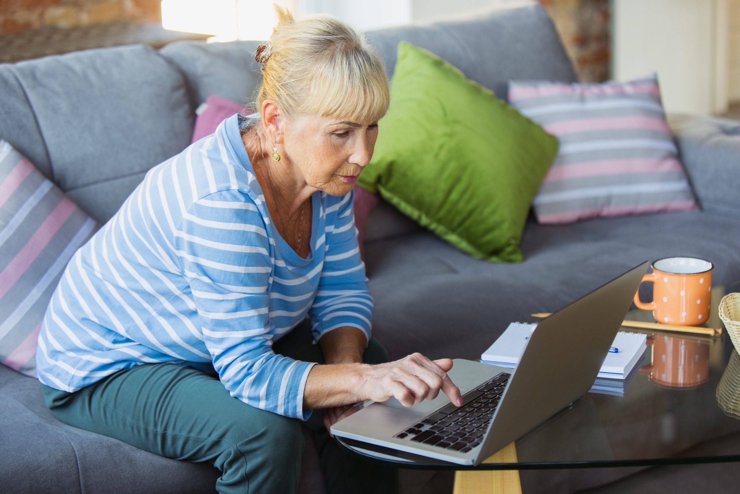 woman using computer at home