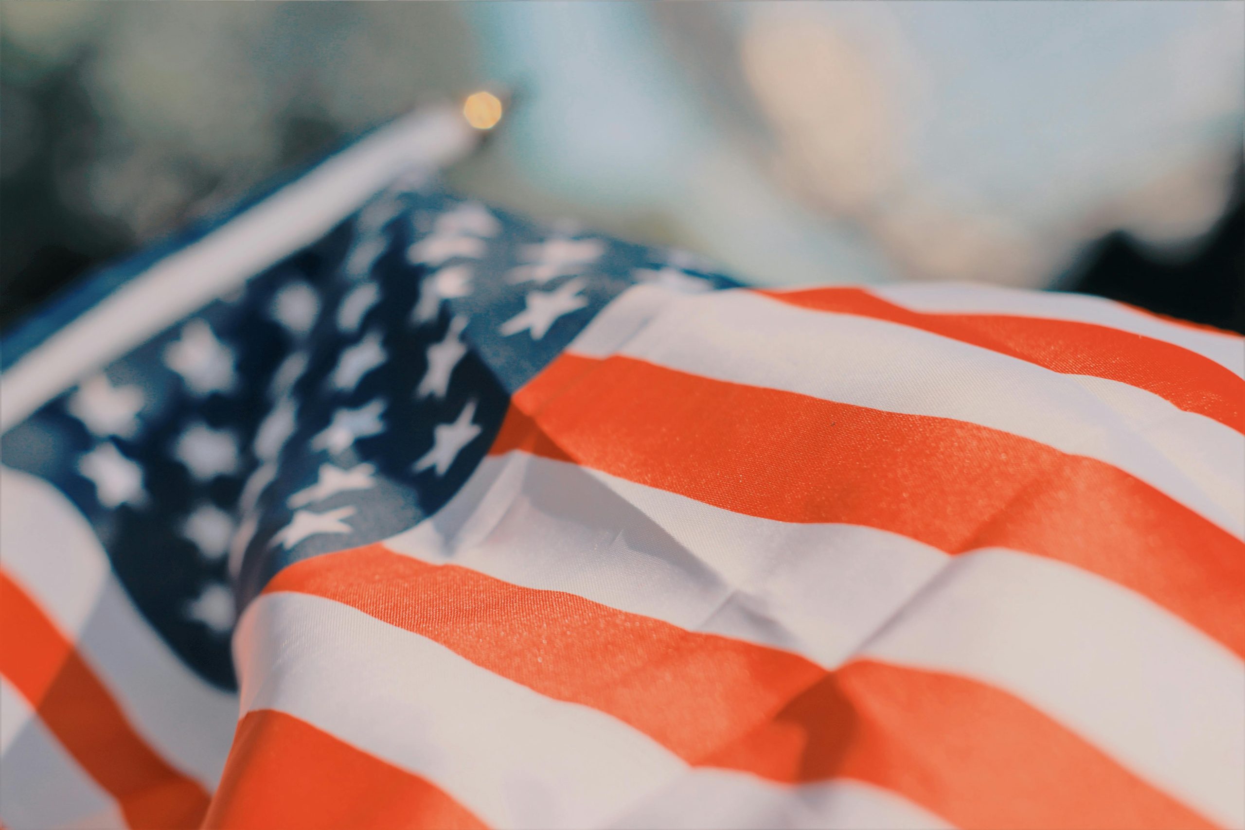 Close-up of a wavy American flag representing patriotism, freedom, and independence.