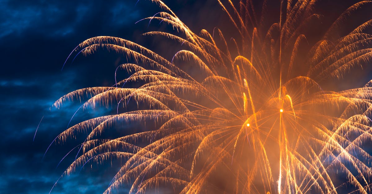 Vibrant fireworks lighting up the night sky in a stunning display of colors, perfect for celebrations.