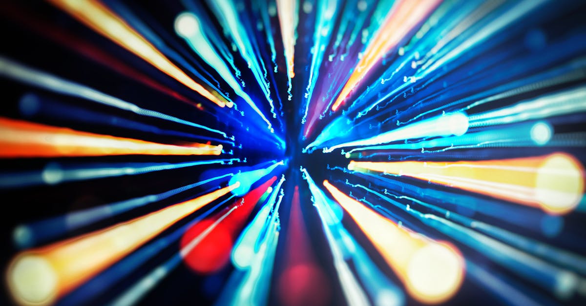 Vivid abstract blur of colorful light streaks in motion creating a dynamic visual effect.